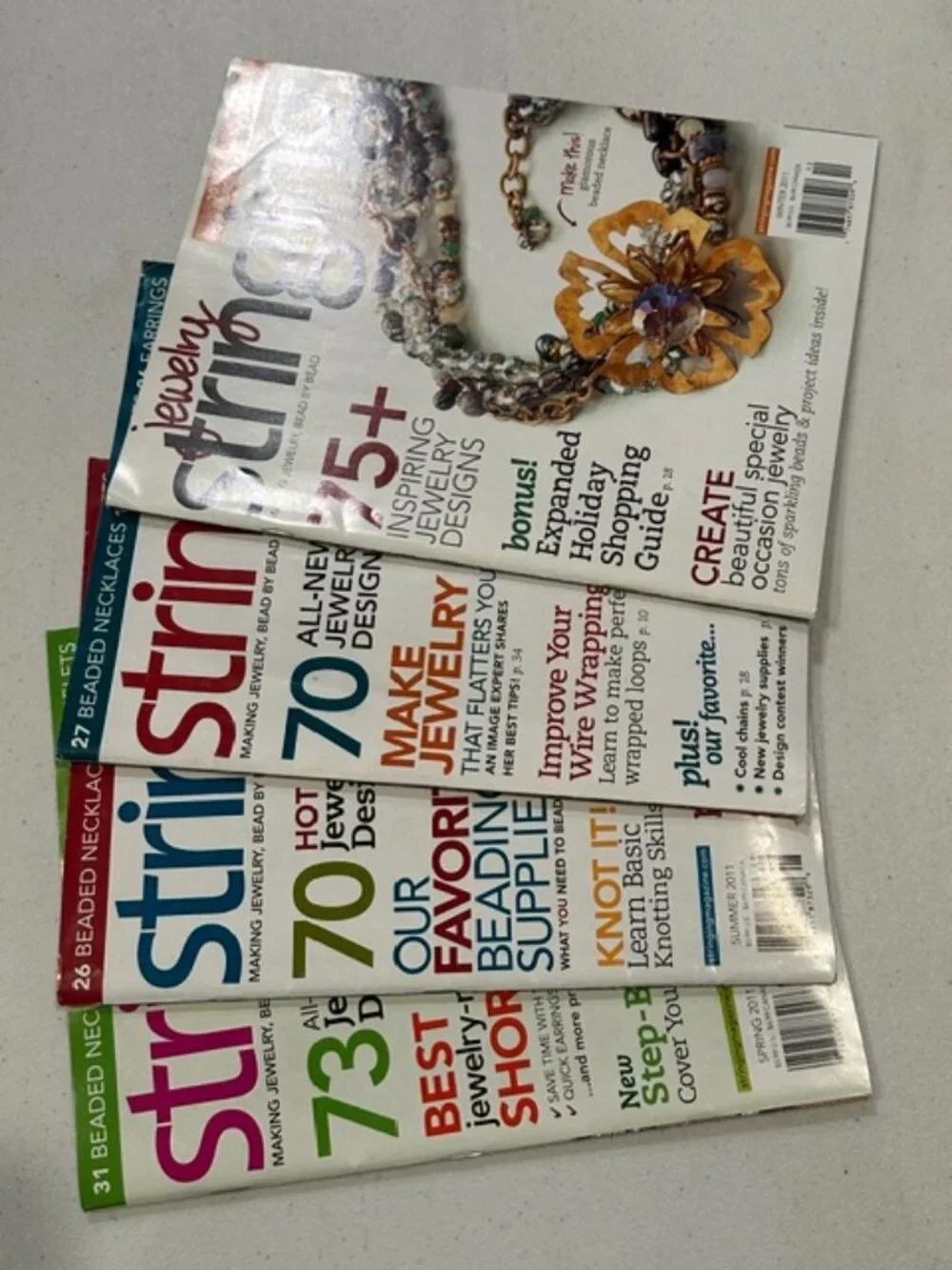 FOUR (4) Issues of Stringing Magazine-Spring, Summer, Fall & Winter 2011